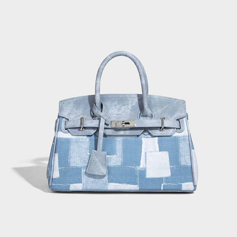 Beaira A niche retro yet cool and stylish platinum bag for women featuring a new denim style with a high-end feel It is a combination of a handheld single shoulder and crossbody design