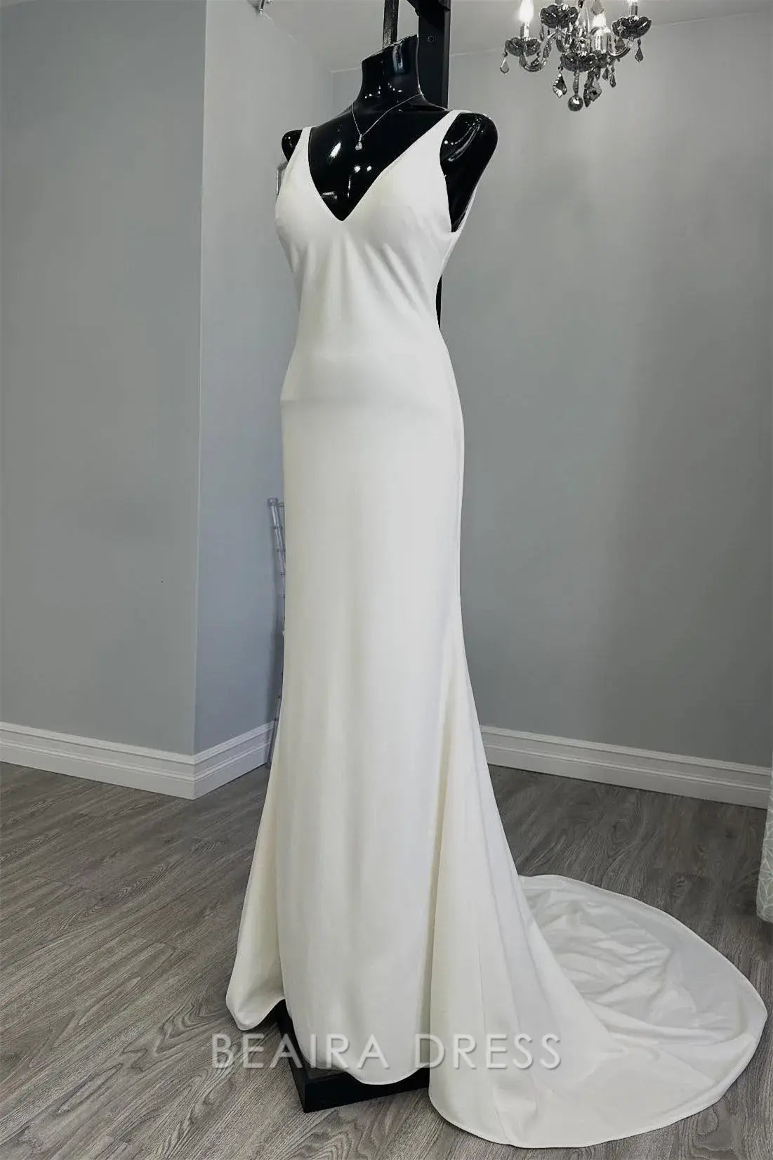 Beaira Elegant Plunging V - Neck Mermaid Wedding Dress with Minimalist Design and Flowing Train for Effortless Bridal Elegance