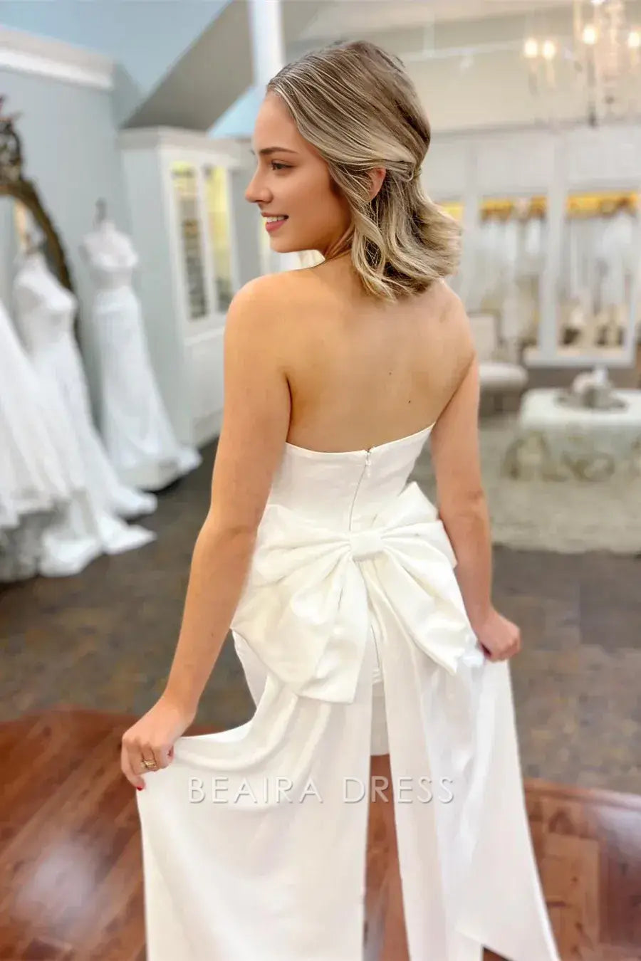 Beaira Elegant Strapless Asymmetric Wedding Dress with Bow Accent and High - Low Hem for Chic Bridal Style