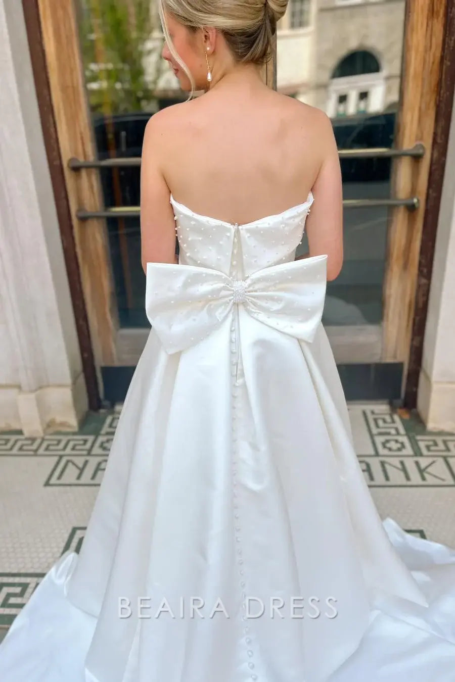 Beaira Elegant Strapless Ball Gown Wedding Dress with Pearl - Embellished Twisted Bodice and Voluminous Satin Skirt for Timeless Bridal Grandeur