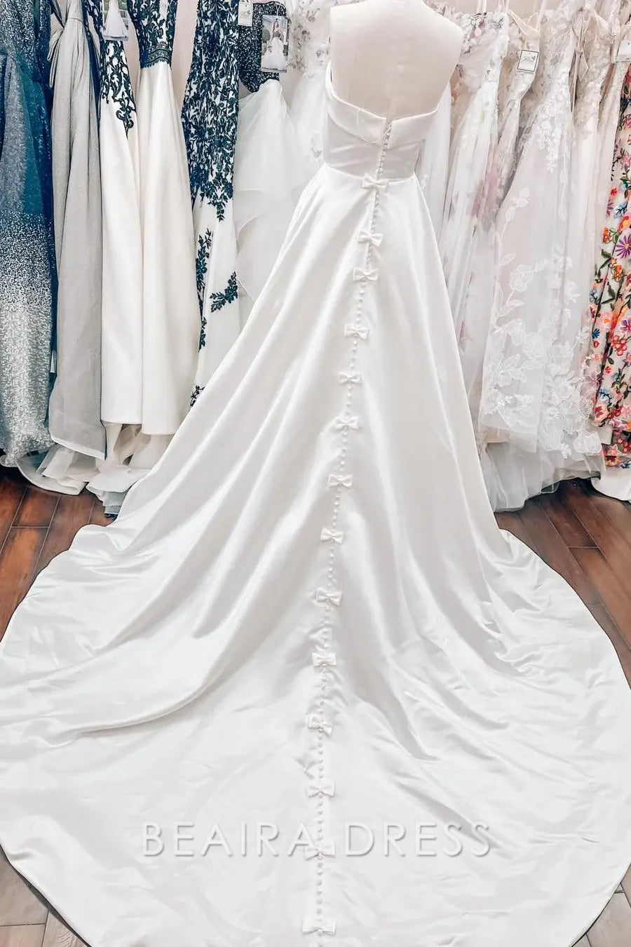 Beaira Elegant Strapless Ball Gown Wedding Dress with Structured Bodice and Flowing Satin Skirt for Timeless Bridal Grace