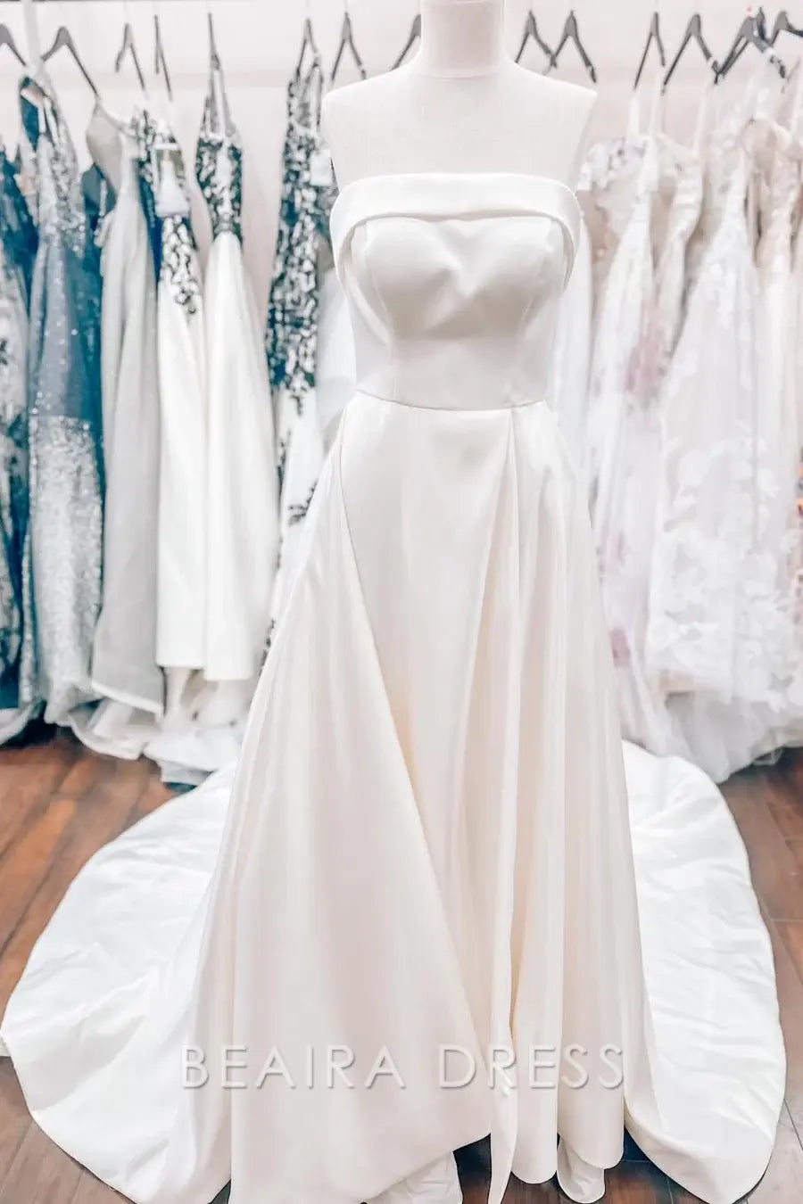 Beaira Elegant Strapless Ball Gown Wedding Dress with Structured Bodice and Flowing Satin Skirt for Timeless Bridal Grace