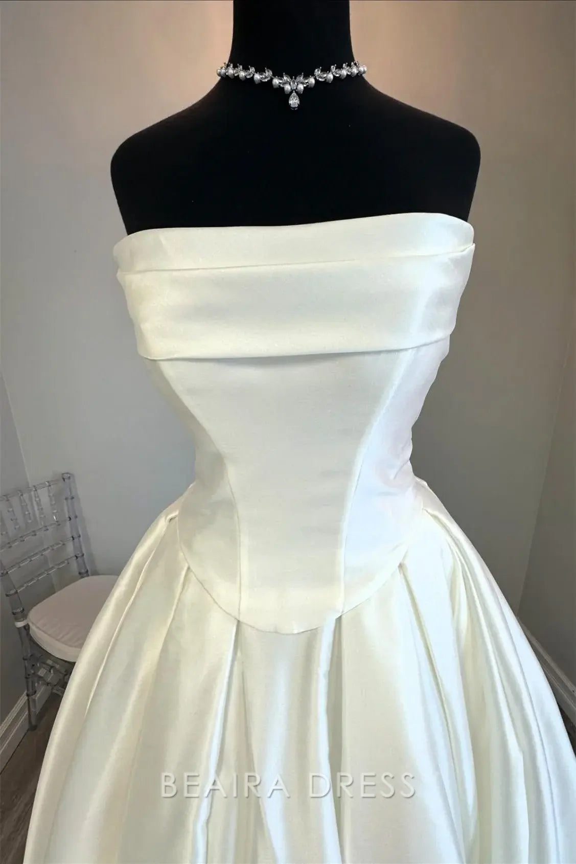 Beaira Elegant Strapless Ball Gown Wedding Dress with Structured Bodice and Voluminous Satin Skirt for Timeless Bridal Grandeur