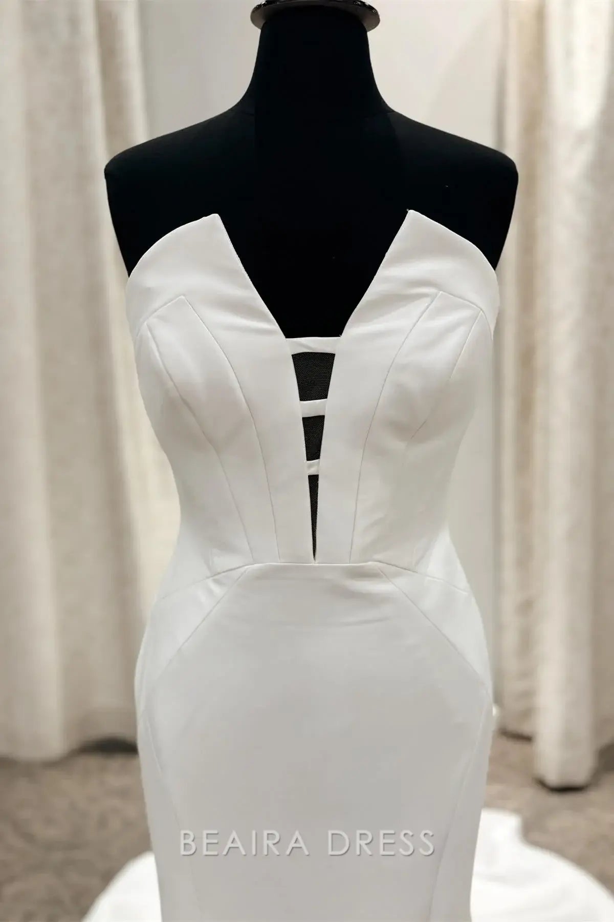 Beaira Elegant Strapless Mermaid Wedding Dress with Cut - Out Detail at Plunging V - Neckline for Modern Bridal Sophistication