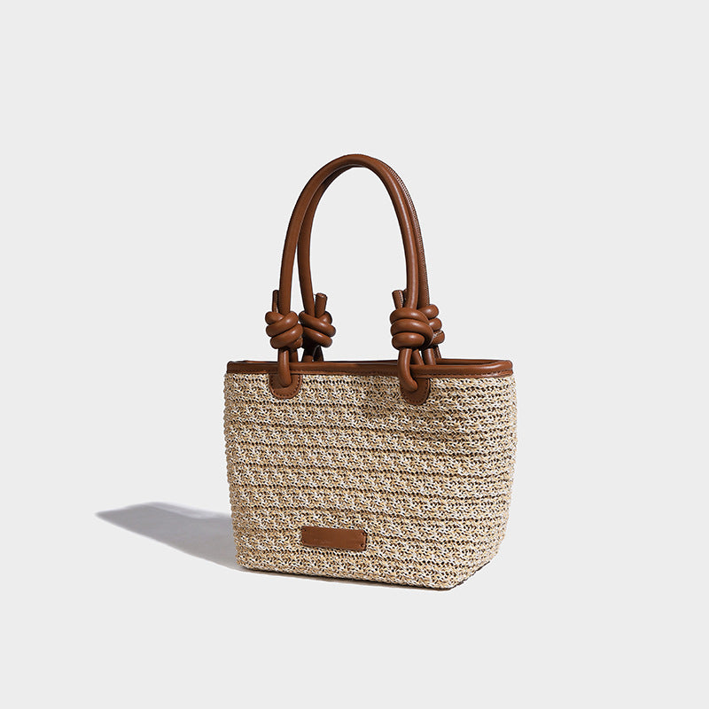 Beaira Spring and summer straw woven hand-held small bucket bag new niche design rope knot beach vacation style vegetable basket bag