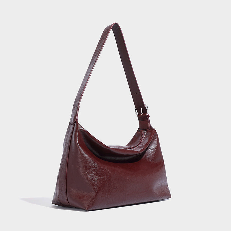Beaira Hot girl commuting soft leather hand-held tote bag motorcycle bag new niche large capacity single shoulder diagonal cross bag