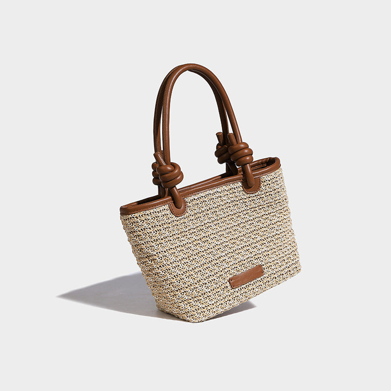 Beaira Spring and summer straw woven hand-held small bucket bag new niche design rope knot beach vacation style vegetable basket bag