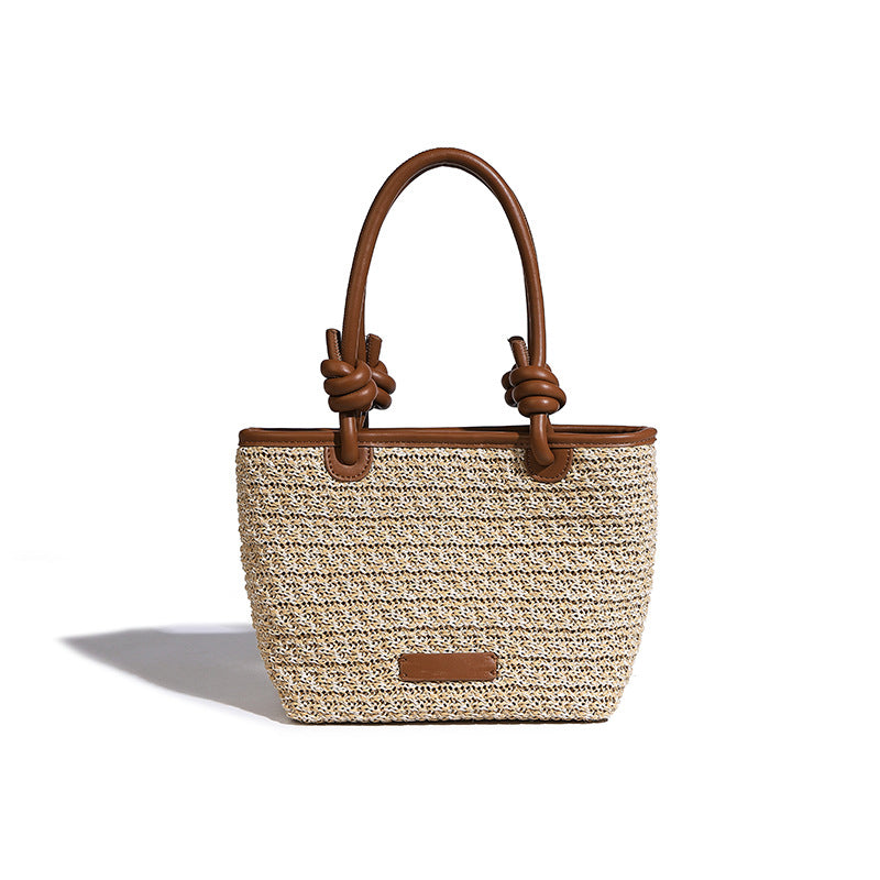Beaira Spring and summer straw woven hand-held small bucket bag new niche design rope knot beach vacation style vegetable basket bag