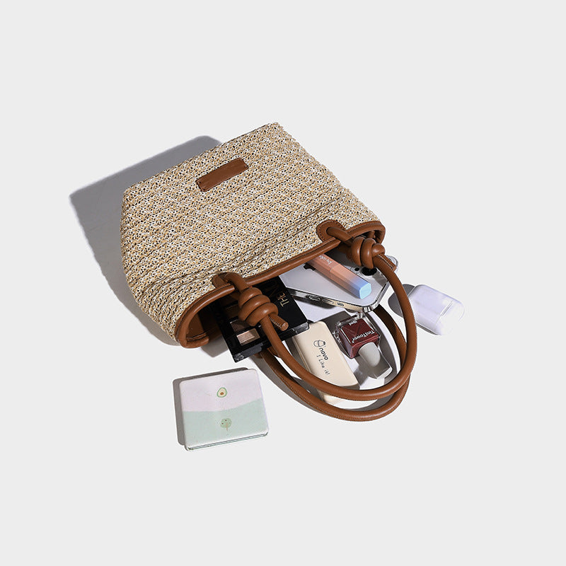 Beaira Spring and summer straw woven hand-held small bucket bag new niche design rope knot beach vacation style vegetable basket bag