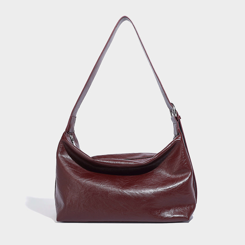 Beaira Hot girl commuting soft leather hand-held tote bag motorcycle bag new niche large capacity single shoulder diagonal cross bag