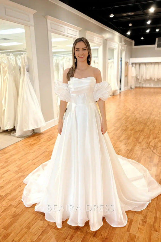 Beaira Elegant Off - the - Shoulder Ball Gown Wedding Dress with Puff Sleeves and Corset Bodice for Romantic Bridal Glamour