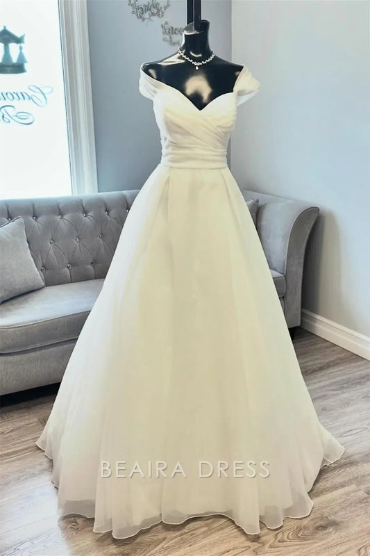 Beaira Elegant Off - the - Shoulder Tulle Ball Gown Wedding Dress with Ruched Bodice and Voluminous Skirt for Timeless Bridal Charm