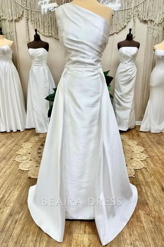 Beaira Elegant One - Shoulder Wedding Gown with Draped Silhouette Embellished Waistband and Flowing Train for Timeless Bridal Grace