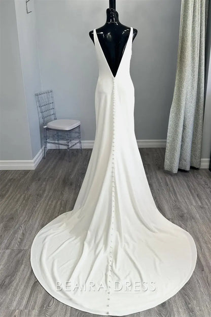 Beaira Elegant Plunging V - Neck Mermaid Wedding Dress with Minimalist Design and Flowing Train for Effortless Bridal Elegance