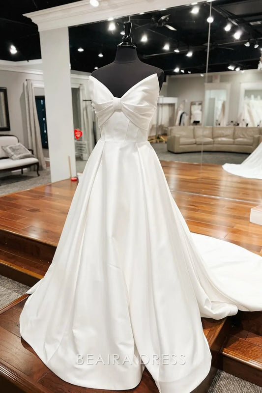 Beaira Elegant Strapless Ball Gown Wedding Dress with Bow - Accented Bodice and Satin Finish for Timeless Bridal Grace
