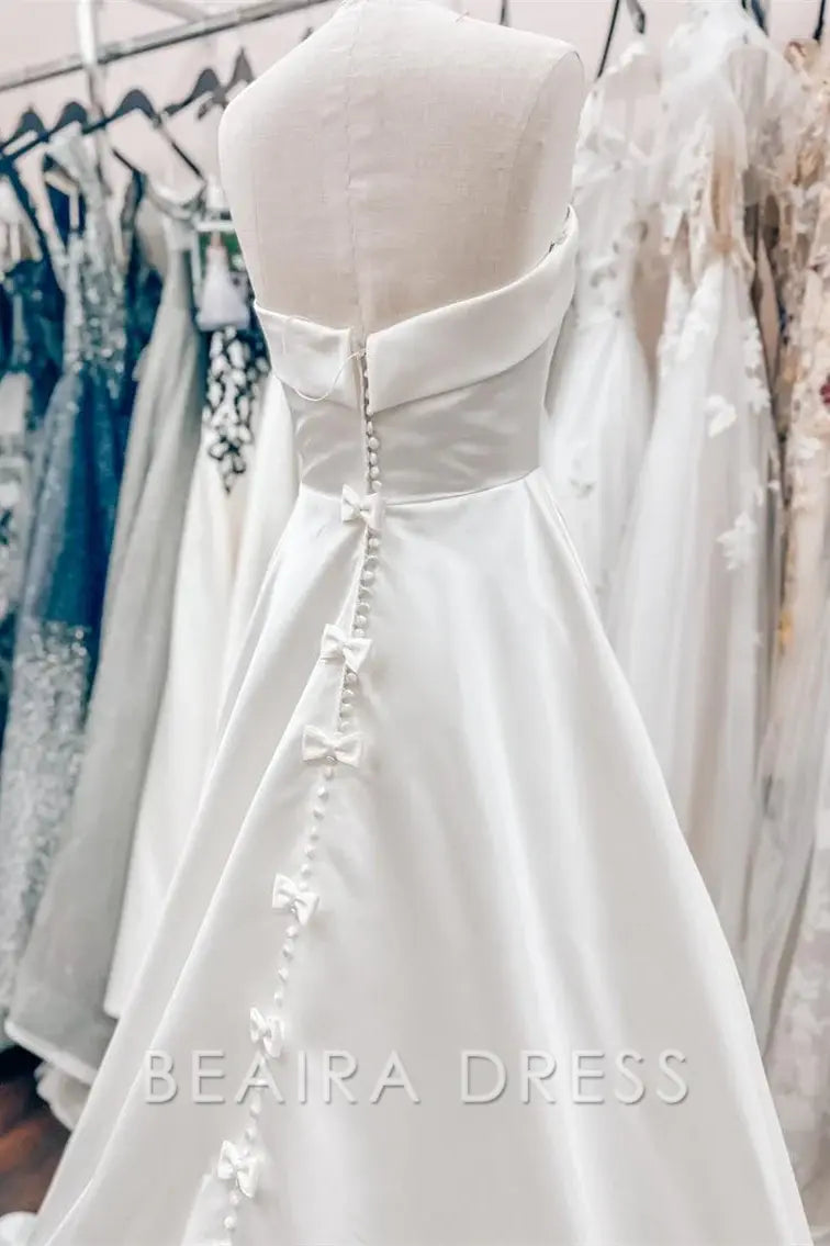 Beaira Elegant Strapless Ball Gown Wedding Dress with Structured Bodice and Flowing Satin Skirt for Timeless Bridal Grace