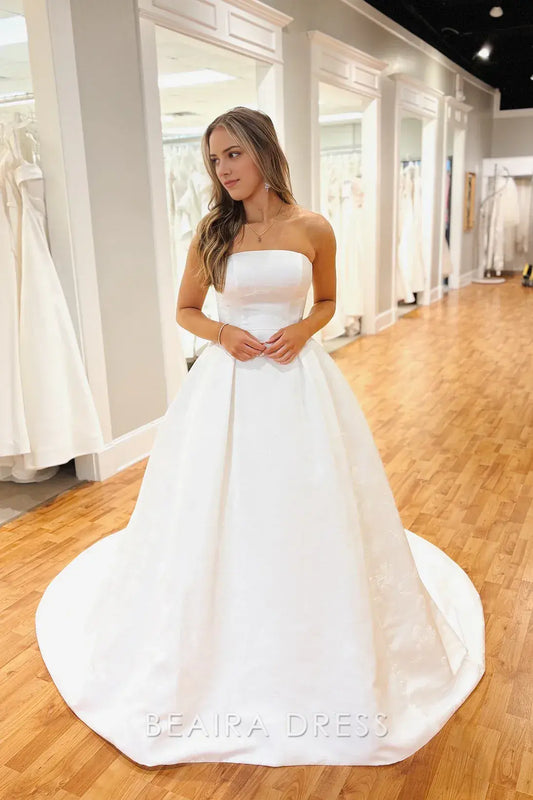 Beaira Elegant Strapless Ball Gown Wedding Dress with Structured Bodice and Subtle Embroidered Details for Timeless Bridal Elegance
