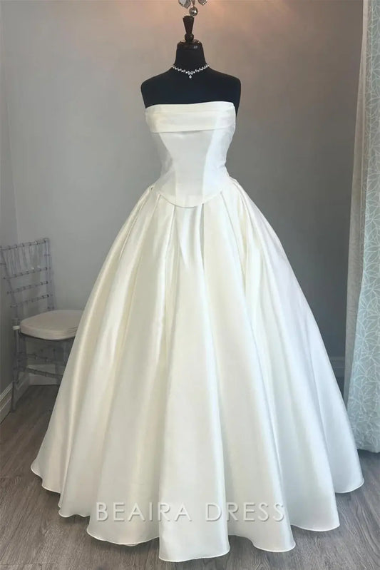 Beaira Elegant Strapless Ball Gown Wedding Dress with Structured Bodice and Voluminous Satin Skirt for Timeless Bridal Grandeur