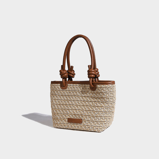 Beaira Spring and summer straw woven hand-held small bucket bag new niche design rope knot beach vacation style vegetable basket bag