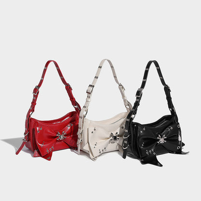 Beaira American style spicy girl sweet and cool butterfly bow design one shoulder underarm bag autumn and winter new rivet motorcycle style handbag