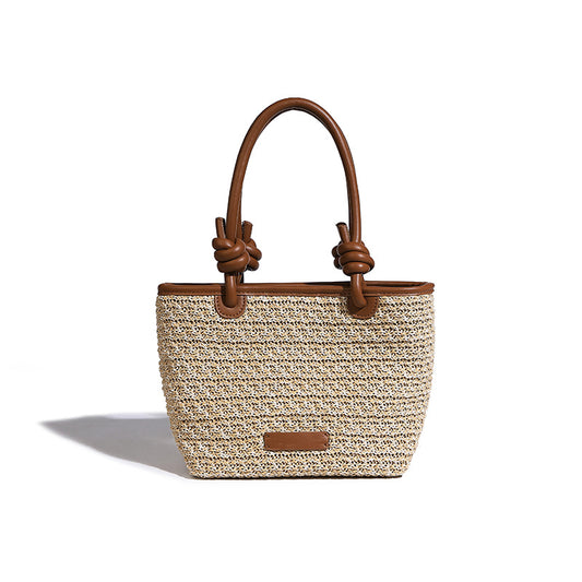 Beaira Spring and summer straw woven hand-held small bucket bag new niche design rope knot beach vacation style vegetable basket bag
